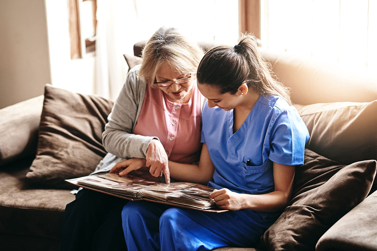 Memory care nurse with patient