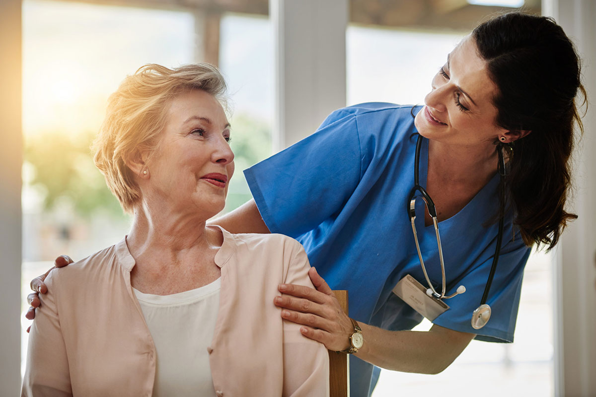 Skilled nursing patient with her nurse