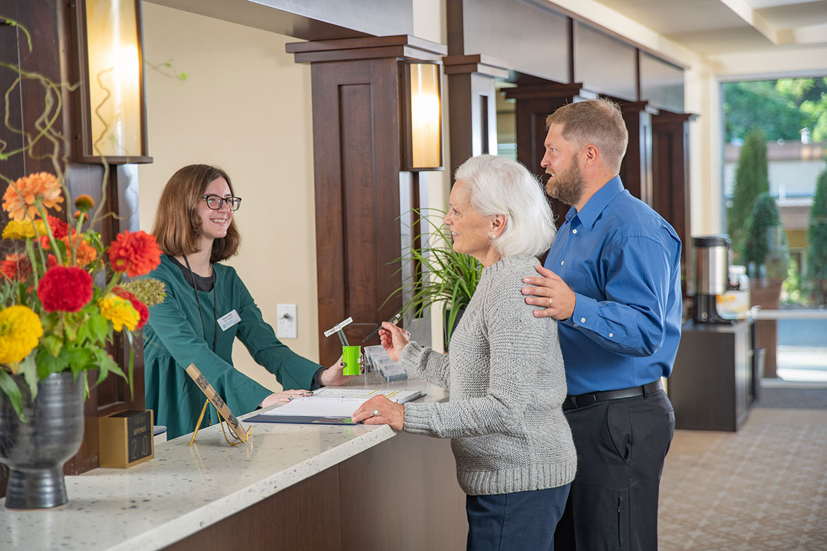 Resident speaking to an employee