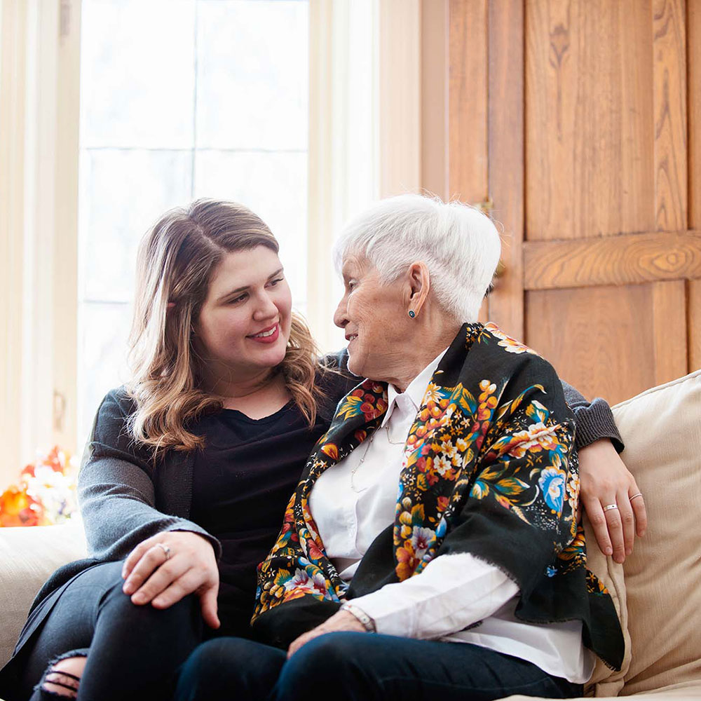 Woman visiting her grandmother