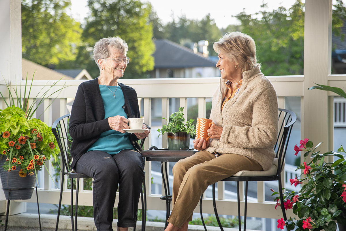 Residents enjoying coffee outside