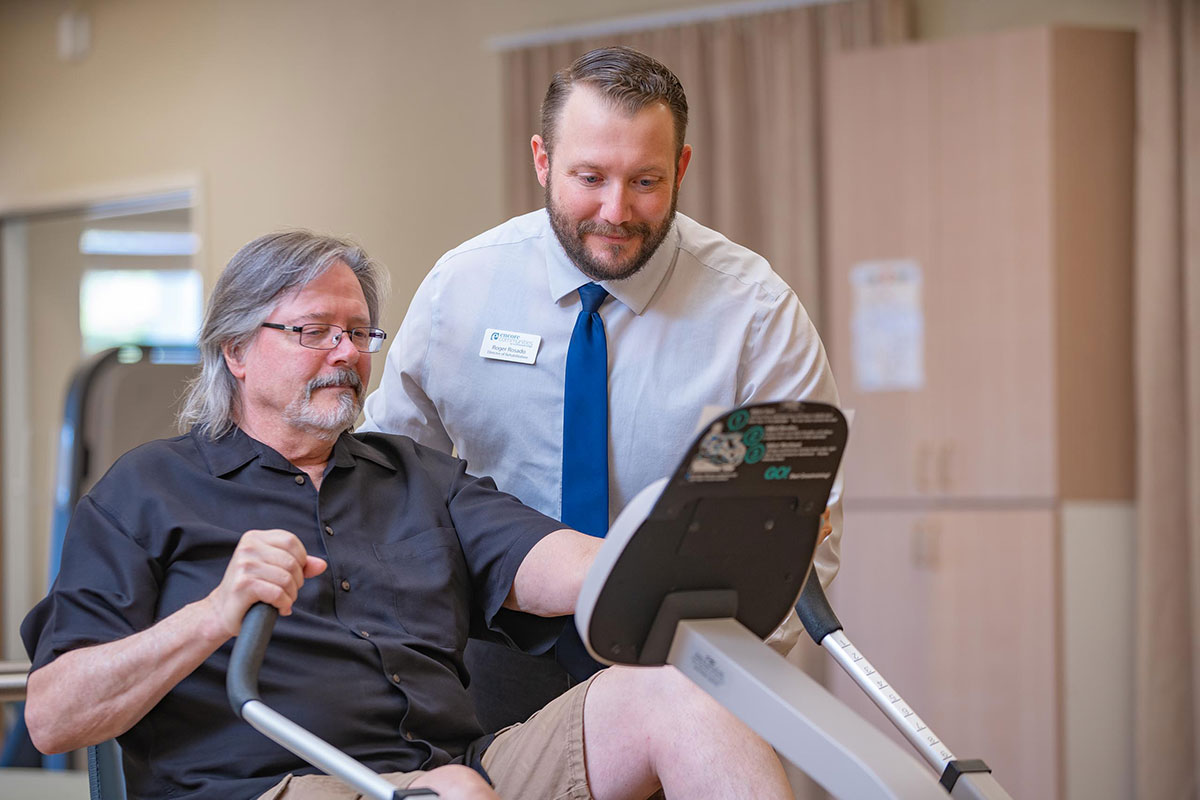 Northwoods Lodge staff member helping a patient with physical rehabilitation