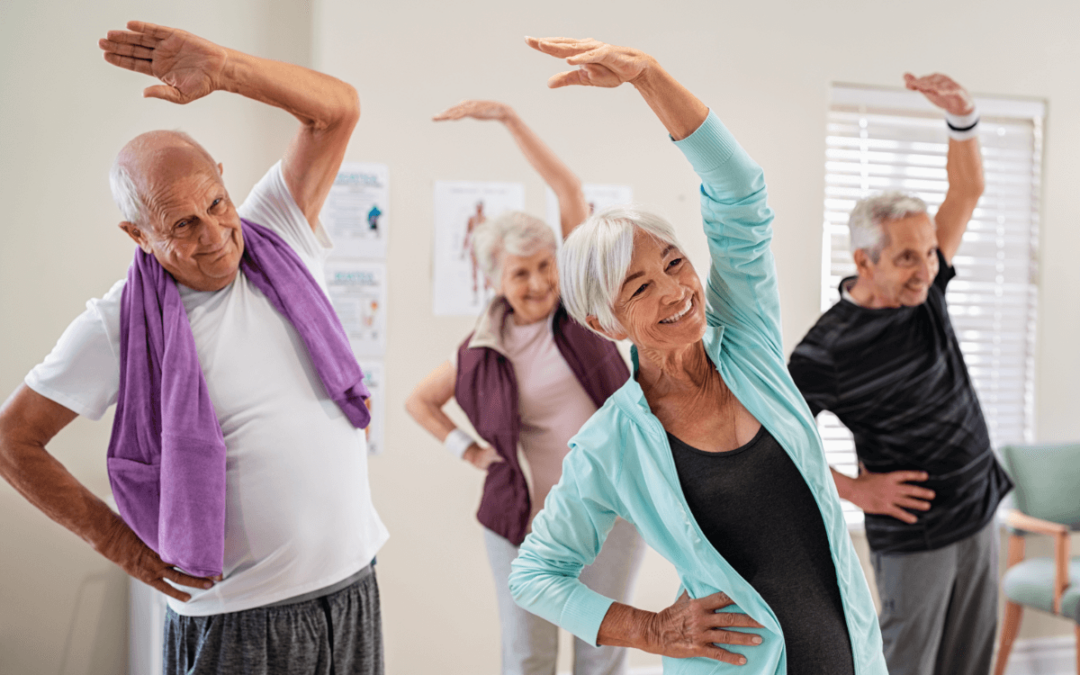 4 senior adults stretching in workout clothes