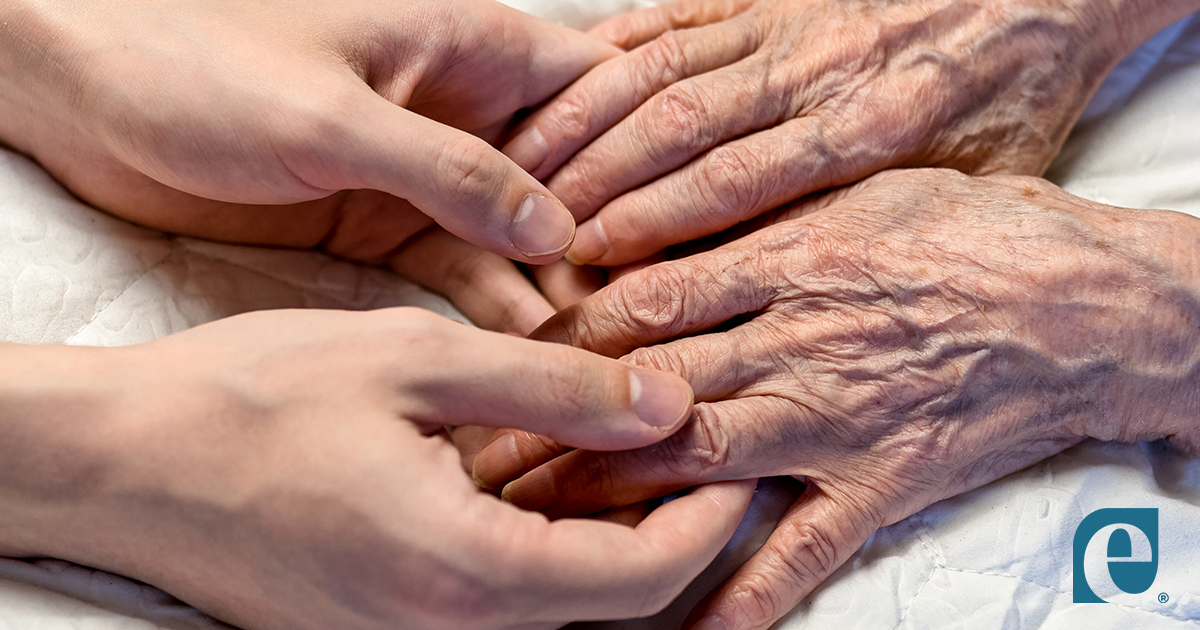 Encore Resources for Aging, young hands gently holding aged hands.